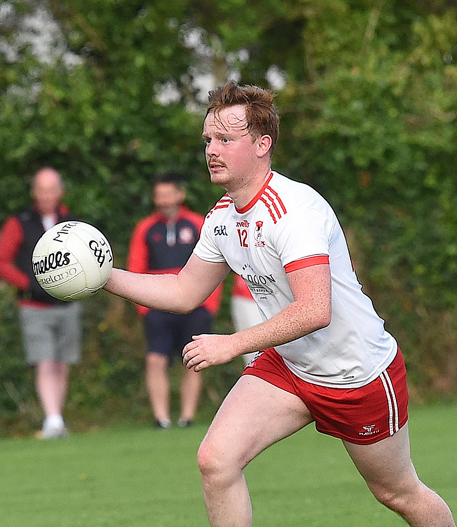Liam Devitt on the attack for John Mitchells. Picture by Arthur Kinahan.