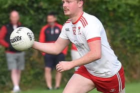 Liam Devitt on the attack for John Mitchells. Picture by Arthur Kinahan.