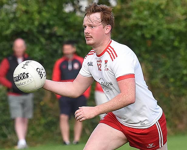 Liam Devitt on the attack for John Mitchells. Picture by Arthur Kinahan.