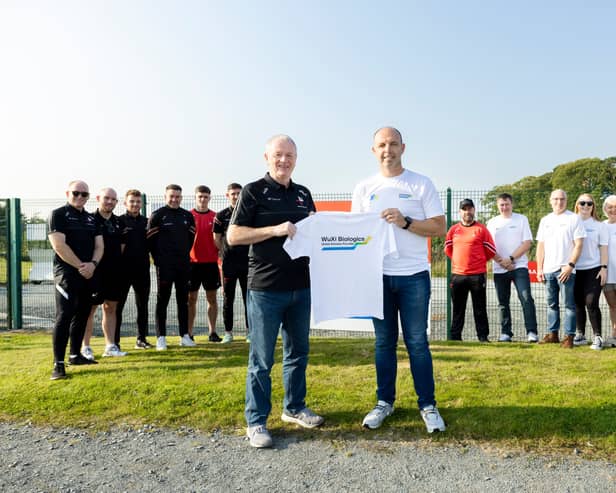 Seán McClean, Louth GAA Chairperson and Brendan McGrath, Site Lead and VP of Manufacturing, WuXi Biologics.