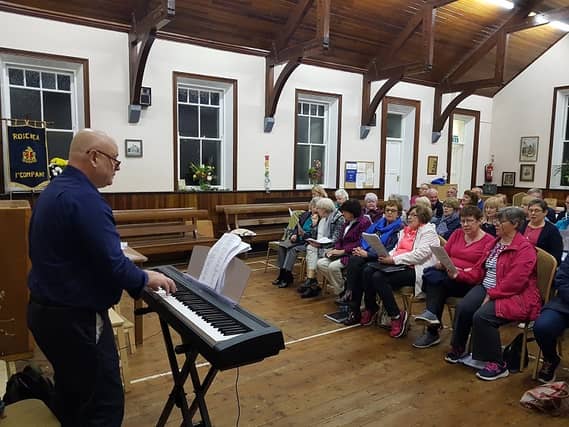 Joining in the open night sing-along at Roscrea community choir