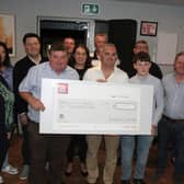 Committee member Brendan Higgins and John Standish (Chairman) presented a cheque for €10,000 to John Leahy and to Michael Dennedy of the “We’re doing it for Dennedy Fund”.