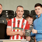 Young Irelands captain Sean Middleton receives the Junior A trophy from Jack Kavanagh, JJ Kavanagh (sponsor) and Pat Cooney, chairman Kilkenny junior board. Picture: Willie Dempsey