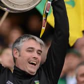 Dr Charlie McManus lifts Sam Maguire at Croke Park in 2012