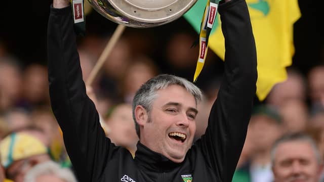 Dr Charlie McManus lifts Sam Maguire at Croke Park in 2012