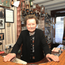 The late Peg Carmody behind the bar in Hospital in 2022 I PICTURE: Brendan Gleeson