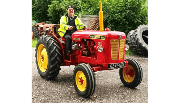 Pat Murphy in his 1962 David Brown 850, which he is driving along the 2,800km Wild Atlantic Way at top speed of 24kph to raise money for Concern and Gaza.