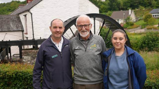 Donegal Half Marathon Ambassador, Danny McDaid, pictured with New Mills Corn and Flax Mill staff members, Tony McHugh and Aimee Grimes