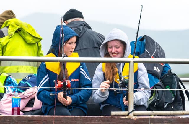 Julie(15) and Katie(15) chatting at the IFI-sponsored Newport SAC National Junior Sea Angling Championship, 2024