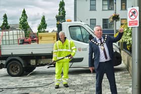 Chair of the Council, Councillor Eugene McConnell is delighted the Council secured the important funding for a third year. He is pictured out with the chewing gum removal equipment.