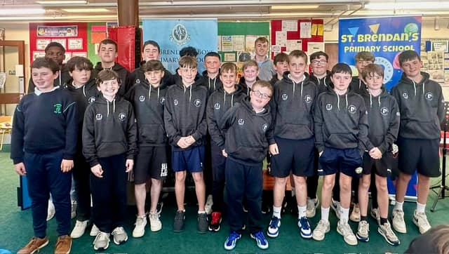 St Brendan's PS 6th class at their graduation event with Adam Screeney.