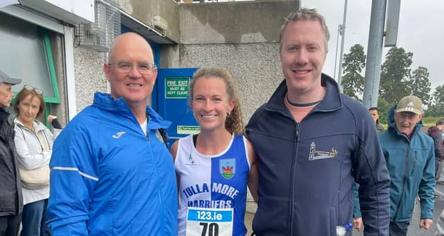 Madison Mooney with her father Chris and second cousin Pat Nolan at Morton Stadium on Saturday.