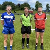 Andrea Moran, Ballyroan, with ref Angela Gallagher, Meath, and Galway captain,  Ailbhe Davoren in the Duggan Park. Pic: Laois LGFA