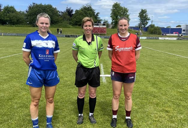 Andrea Moran, Ballyroan, with ref Angela Gallagher, Meath, and Galway captain, Ailbhe Davoren in the Duggan Park. Pic: Laois LGFA