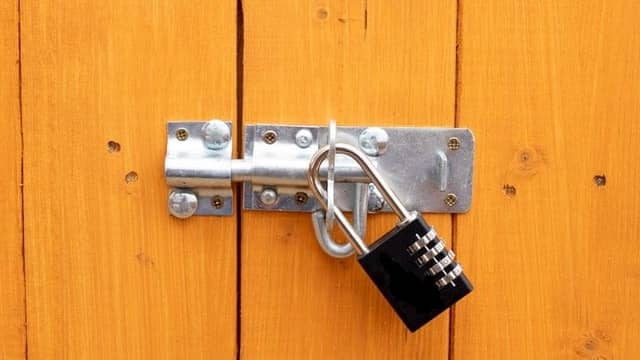 File Photo of padlock on garden shed