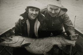 Pictured is Drumshanbo pike expert, the late Packie Joe Reynolds with Roy Smyth and a 25lbs pike returned alive to the lough many years ago.