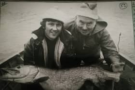 Pictured is Drumshanbo pike expert, the late Packie Joe Reynolds with Roy Smyth and a 25lbs pike returned alive to the lough many years ago.