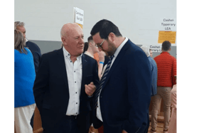 Re-elected Carrick-on-Suir LEA councillors Kieran Bourke (FF) and Mark Fitzgerald (FG) in deep discussion during the count in Thurles