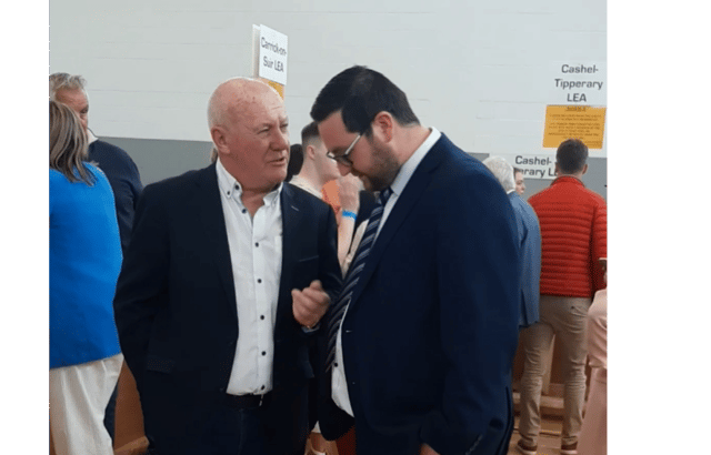 Re-elected Carrick-on-Suir LEA councillors Kieran Bourke (FF) and Mark Fitzgerald (FG) in deep discussion during the count in Thurles