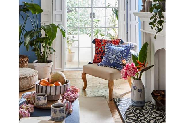 5. Floral Vivid Vase Reversible Cushion, £28, Elegant Embroidery Reversible Cushion (behind), £35, Joe Browns