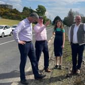 Dakota Nic Mheanman, Deputy Pearse Doherty and Chris MacManus hear from locals about the problem