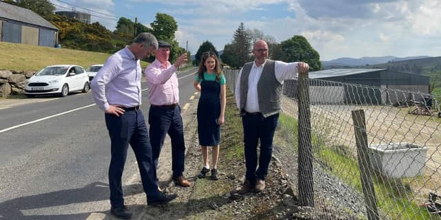 Dakota Nic Mheanman, Deputy Pearse Doherty and Chris MacManus hear from locals about the problem