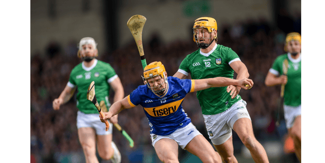 Tipperary’s Sean Hayes struggles to get away from Limerick’s Tom Morrissey during last Sunday’s game at the TUS Gaelic Grounds. Picture: Tom Beary/Sportsfile