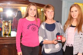 Patricia Harkin with Illies Celtic players Emma Doherty and Alison McGonigle in 2019