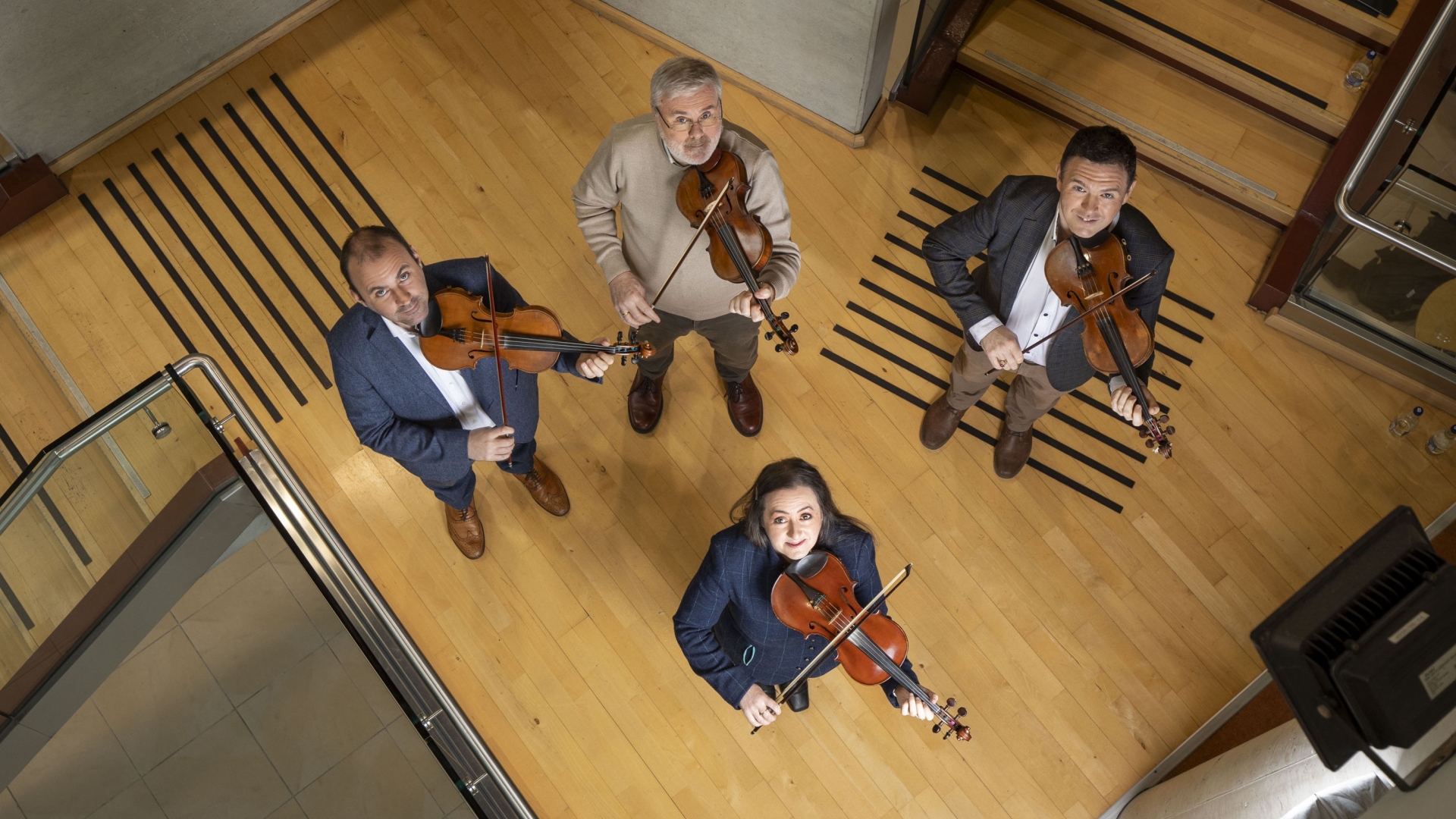 Some members of Cairdeas na bhFidiléirií, Connor Caldwell, Caoimhín MacAoidh, Aidan O'Donnell and Tara Connaghan who are to be honoured by TG4  for their outstanding contribution to Irish Culture