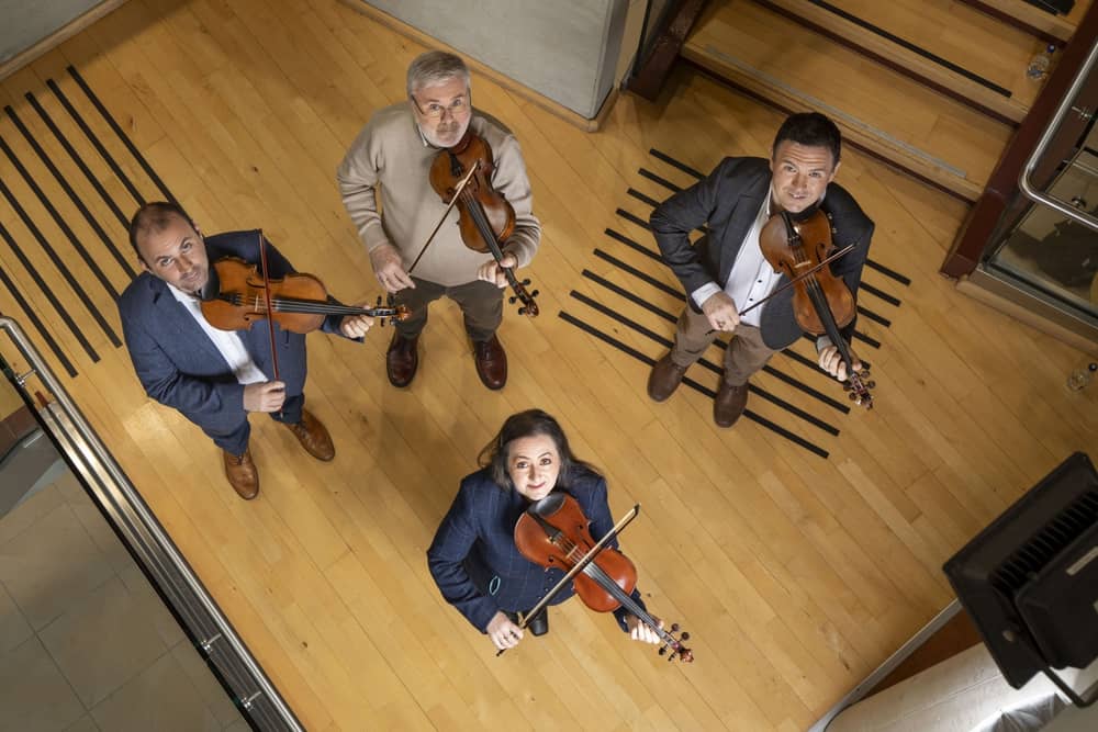 Some members of Cairdeas na bhFidiléirií, Connor Caldwell, Caoimhín MacAoidh, Aidan O'Donnell and Tara Connaghan who are to be honoured by TG4  for their outstanding contribution to Irish Culture