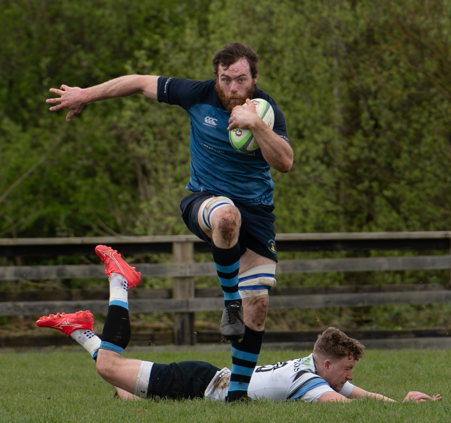 CATCH ME IF YOU CAN! Kilfeacle and District RFC captain, Kevin Kinnane, breaks a tackle to set up Kilfeacle’s first try against Shannon in the Munster Junior Cup quarter-final played in Limerick