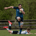 CATCH ME IF YOU CAN! Kilfeacle and District RFC captain, Kevin Kinnane, breaks a tackle to set up Kilfeacle’s first try against Shannon in the Munster Junior Cup quarter-final played in Limerick