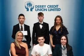 Amanda Johnson, Conor Roberts Lynch, winner of the Carer Award, and Mary-Kate Tierney, runner-up. Standing from left, are Marcus Swerdlick, Ryan McLaughlin and Ava Doherty.
