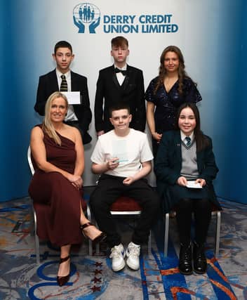 Amanda Johnson, Conor Roberts Lynch, winner of the Carer Award, and Mary-Kate Tierney, runner-up. Standing from left, are Marcus Swerdlick, Ryan McLaughlin and Ava Doherty.