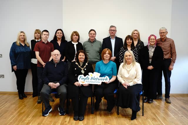 Foyle Network Foundation staff and board alongside Mayor of Derry City & Strabane District Council Cllr Patricia Logue