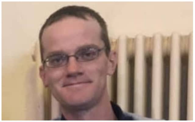 Keith is described as 5ft 9” tall, of slim build, with dark brown hair and blue eyes