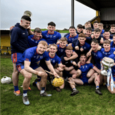 The Mary Immaculate College Limerick squad celebrate with the Fitzgibbon Cup after their exciting final victory over UL at Abbeydorney on Saturday | PICTURE: Sportsfile