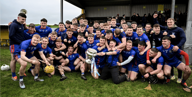 The Mary Immaculate College Limerick squad celebrate with the Fitzgibbon Cup after their exciting final victory over UL at Abbeydorney on Saturday | PICTURE: Sportsfile