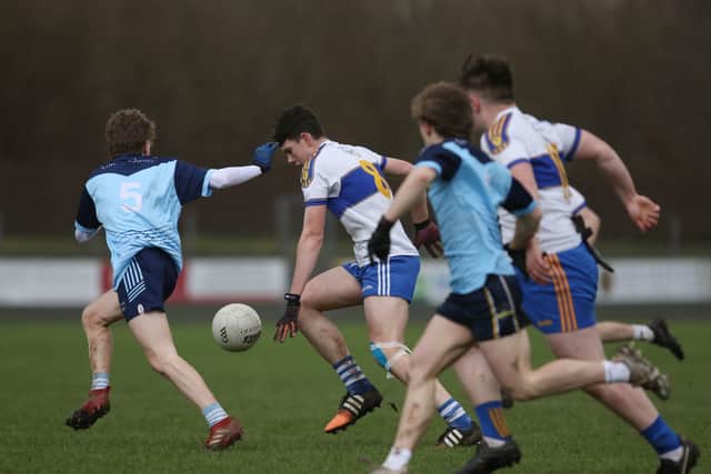Midfielder Ruairi Caomhánach’s maximum, six minutes into the tie, opened up a 2-1 to 0–0 score lead. His midfield partner Lucas MacAonghusa had kicked the first three-pointer two minutes earlier when he got on the end of a good move to drill to the back of Lumen Christi net.