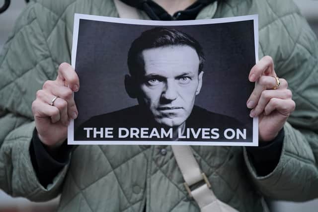 Protesters gather outside Russian Embassy following Alexei Navalny’s death