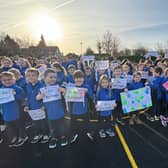Kids at Parteen National School show their support Operation Transformation leader Darragh Fitzgerald