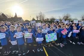 Kids at Parteen National School show their support Operation Transformation leader Darragh Fitzgerald