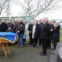 Derry Republican's gather at the Shantallow Monument to pay tribute to veteran Republican Gerry McCartney.