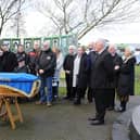 Derry Republican's gather at the Shantallow Monument to pay tribute to veteran Republican Gerry McCartney.