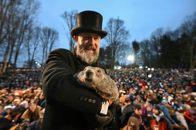 Just after sunrise on Friday, the Punxsutawney Groundhog Club announced that Phil had not seen his shadow, which would usher in early spring-like weather. The groundhog seeing his shadow presaged six more weeks of winter, according to the group.