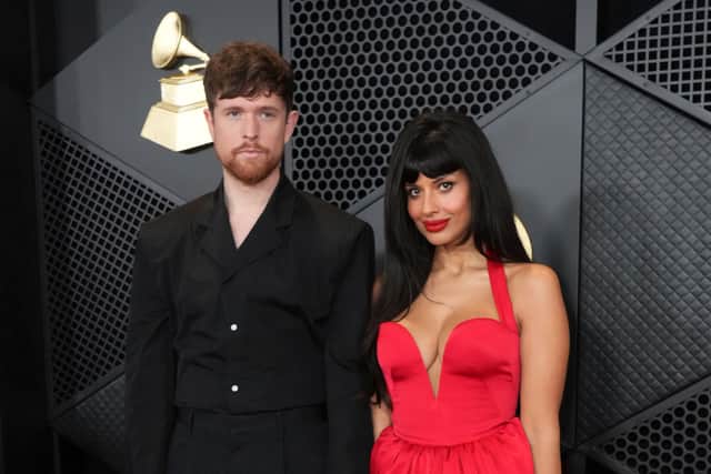 She wore a blood-red floor-length Dolce & Gabbana dress with a mesh cape which also had a corset that held the silhouette together.