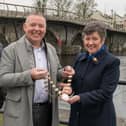 Incoming President of Carrick-on-Shannon Chamber Finola Armstrong-McGuire is presented with the chain of office by Colm McGrath. Also pictured is Brendan Dee, Chief Operations Officer.