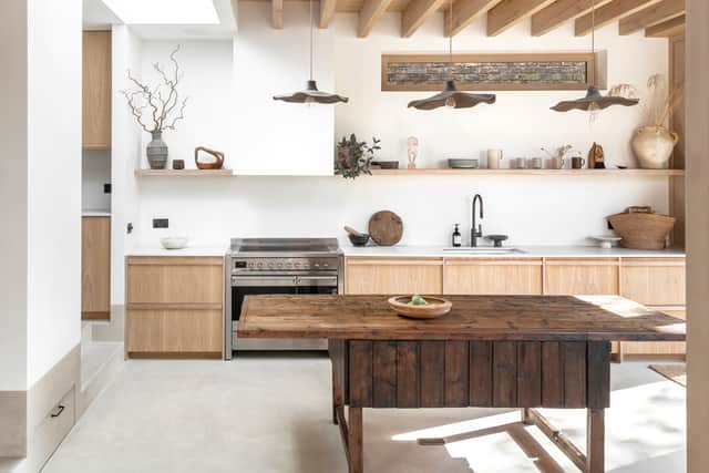 Painted wooden cabinetry has been a popular mainstay in kitchen design for years, says Harrison. “However, we’re seeing an emerging trend of unpainted wooden cabinets creep in, with homeowners increasingly opting to let the natural wood grain shine through by foregoing paint on their kitchen cabinets.”