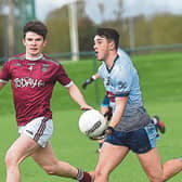 Tadgh Kellett Glyde Rangers taking on Daingeans Stephen Joyce. Pic: Arthur Kinahan
