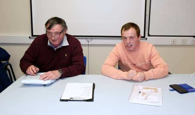 Michael Brett and Tommy Barrett pictured at a committee meeting